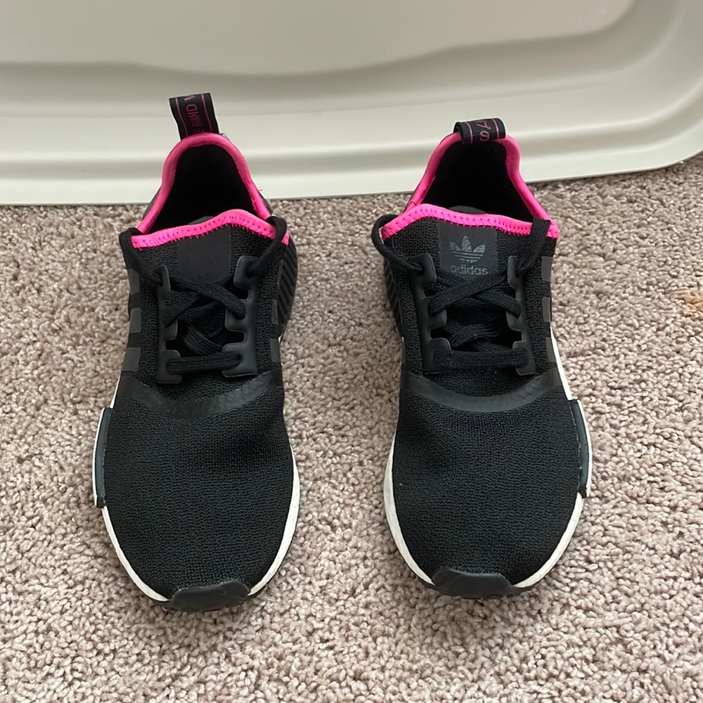 Nike NMD. They are in a kids size says 4 1/2 on shoe, but fits about 5 1/2.